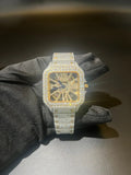 Iced out Cartier skeleton dial gold
