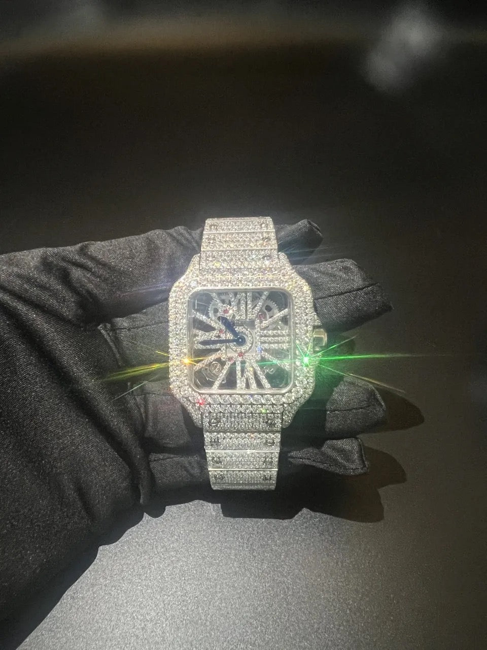 Iced out Cartier skeleton dial